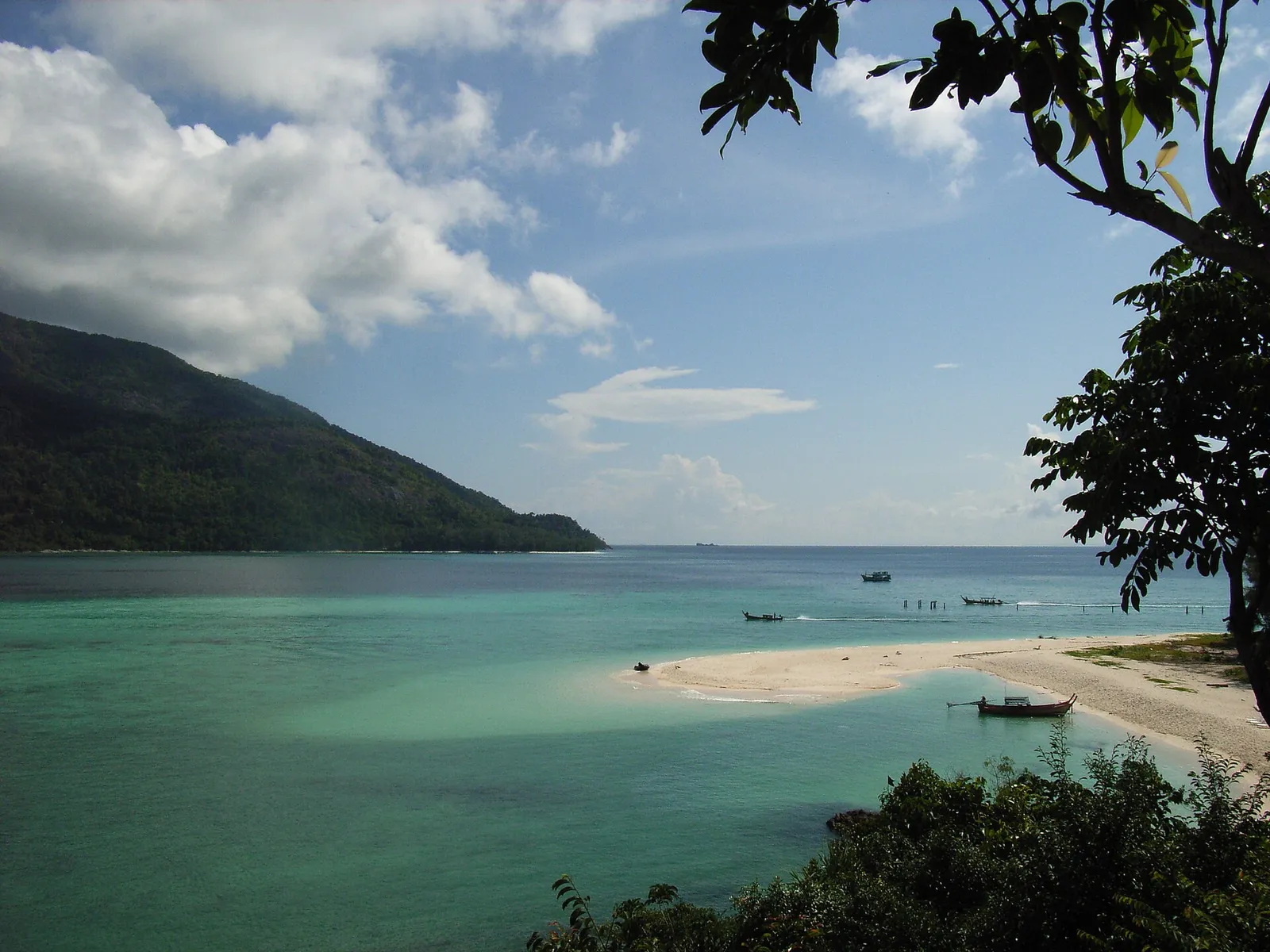 View over a Koh Lipe beach and sandbar towards Koh Adang